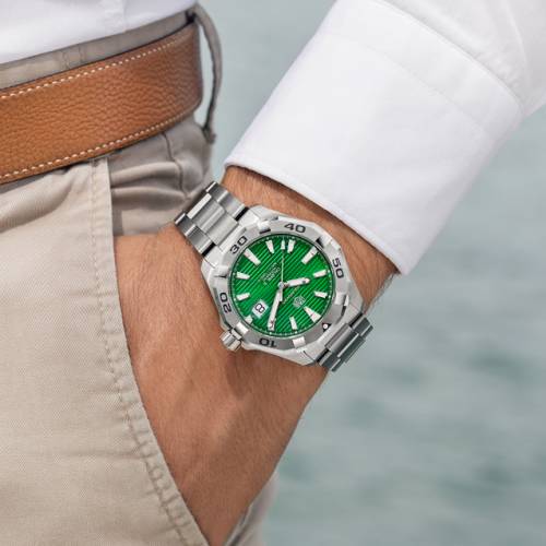 Two green-dialled TAG Heuer Aquaracer models