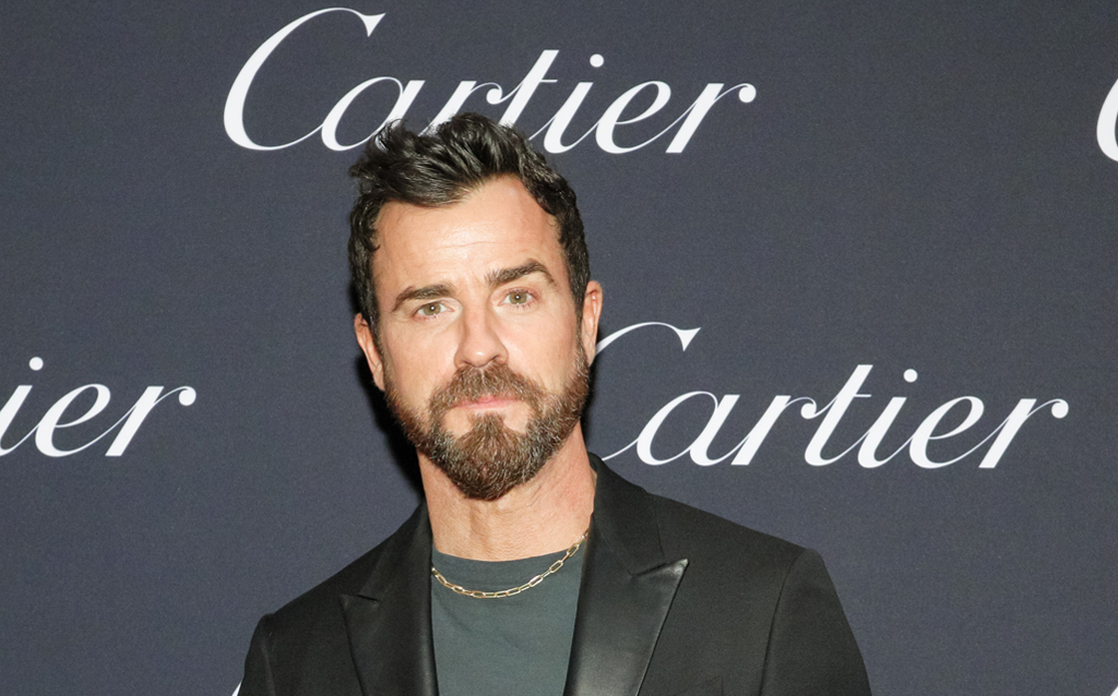 Justin Theroux Santos de Cartier necklace, Santos de Cartier bracelet, Cartier Juste un Clou bracelet, and Love ring