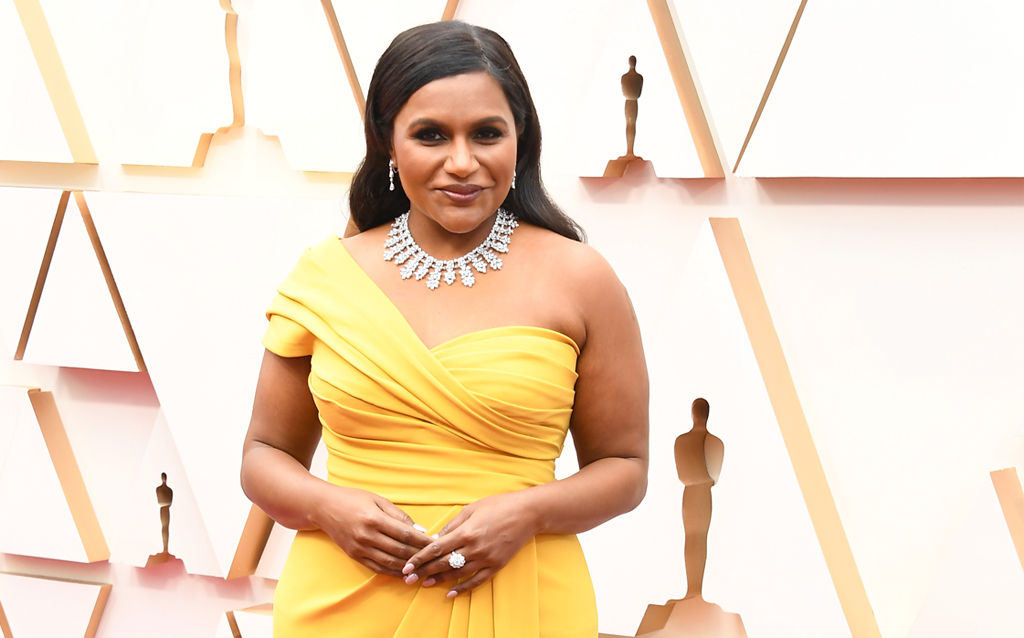Mindy Kaling wore a  diamond necklace and earrings both from the Haute Joaillerie collection, and a ring featuring a round brilliant-cut diamond and round-shaped diamonds set in white gold from the Magical Setting collection.