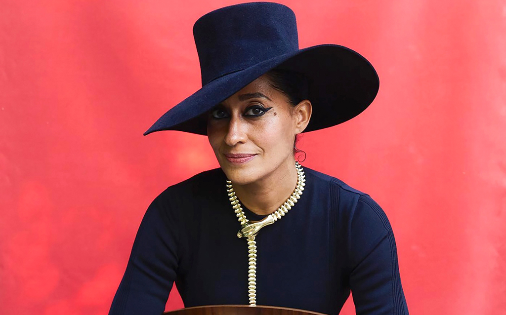 Tracee Ellis Ross wears Elsa Peretti® Snake necklace in 18k gold, extra large by Tiffany & Co.