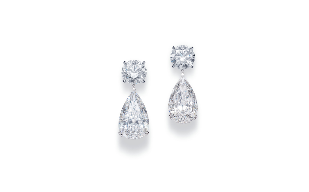 Earrings in white gold set with two pear-shaped D-Flawless diamonds weighing 7 and 7.2 carats, and two D-Internally Flawless brilliant-cut diamonds weighing 2.6 and 2.5 carats