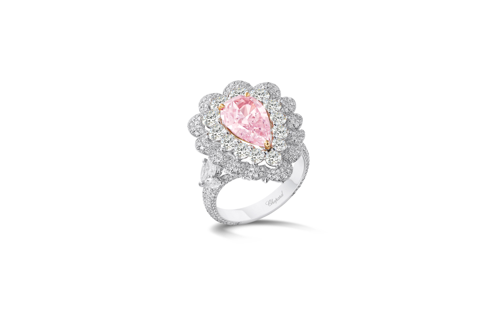White and rose gold ring set with a pear-shaped 2.4-carat fancy pink diamond and fancy-cut white diamonds