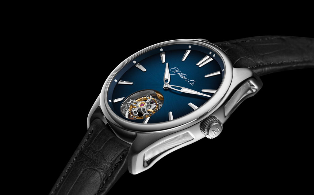 H. Moser & Cie Pioneer Tourbillon.  A flying tourbillon equipped with a double hairspring, designed for everyday wear, offering a 3-day power reserve, in a steel case water-resistant to 120 metres: the Pioneer Tourbillon model from H. Moser & Cie. is one of the few tourbillons which can be worn, with great elegance, in any circumstance. H. Moser & Cie. is once again blending genres, offering a sporty reinterpretation of the tourbillon, a resolutely modern and contemporary version of the traditio