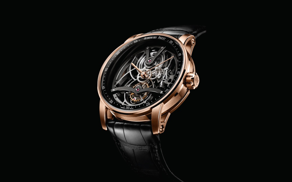 Code 11.59 Tourbillon Openworked.  The 41 mm pink gold case houses an  openworked tourbillon movement that conveys a sense of complexity and depth. The skeleton hand-wound calibre 2948 finished in a contemporary way with dark bridges and plate.